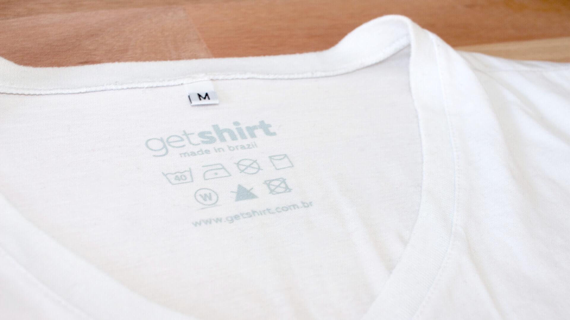 Shirt marking inside with the getshirt brand together with wash and care instructions.